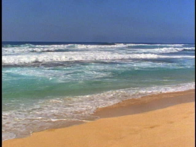 Crashing surf and beach on the North Shore of Oahu in Hawaii
