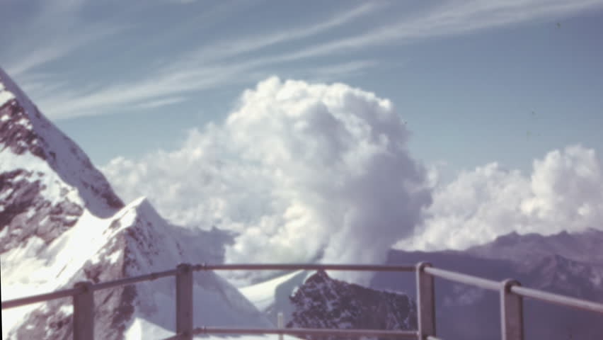 Pitz Bernina, the highest mountain in the Rhaetian Alps near St Moritz, GraubÃ¼nden, Switzerland. A stunning scene of this iconic peak in the 1950s. Color 4K archival footage.