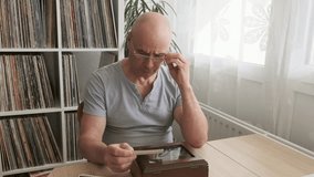 elderly man looks old vintage sepia-toned photographs 1930-1940, nostalgia and memories of youth, parents, remembering family connection generations, Classic romance, Family heirlooms - Powered by Shutterstock - Get 15% off with code: PIKWIZARD15