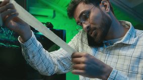 Arabian Indian man male guy work employee engineer programmer hacker freelance coding cyberspace call mobile phone talking office database code monitor analyst specialist developer programming crypto - Powered by Shutterstock - Get 15% off with code: PIKWIZARD15