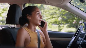 Serious African American woman driver car auto automobile transport vehicle calling answer mobile phone smartphone talking female employee entrepreneur businesswoman speaking girl gadget city business - Powered by Shutterstock - Get 15% off with code: PIKWIZARD15