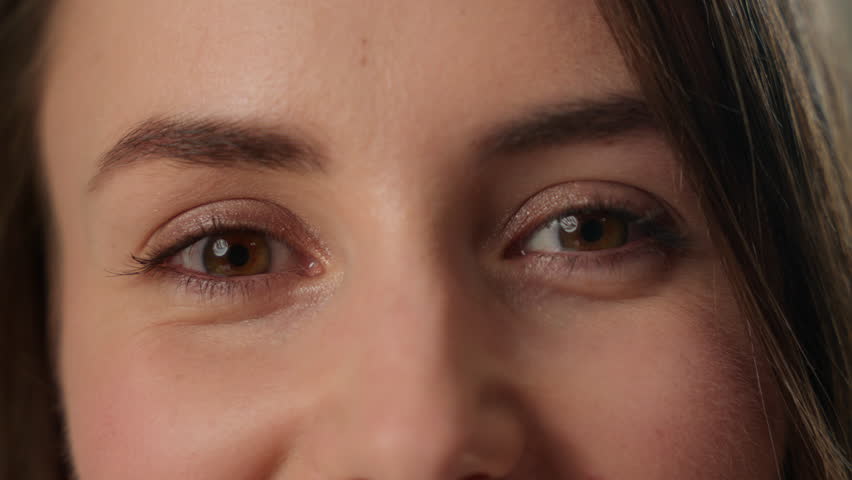 Close up happy eyes Caucasian woman female girl face smiling laughing looking at camera unrecognizable lady vision eyesight enjoy make-up laser correction healthy cropped view medicine smile cosmetics