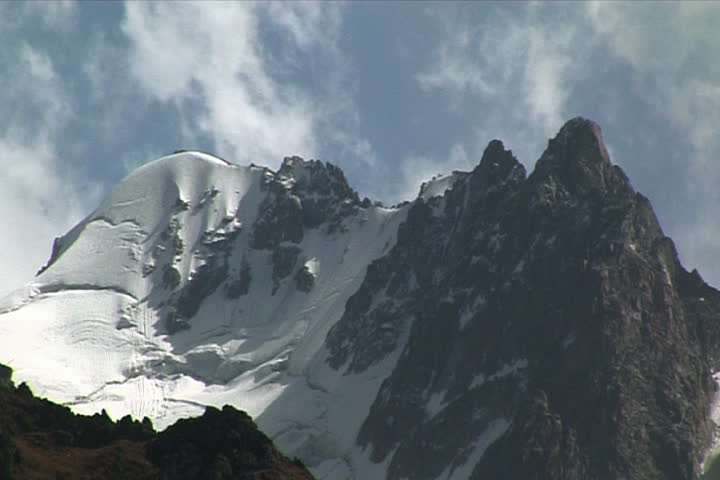 The Mountain top, blue sky, cloud.