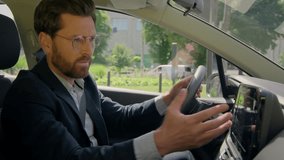 Caucasian man male businessman guy upset driver car owner inside automobile stressed confused auto navigation electric transport navigator road destination error mistake device gps app drive traffic - Powered by Shutterstock - Get 15% off with code: PIKWIZARD15