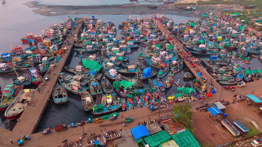 Colorful boats docked closely together, Aerial View Crowded Fishing Harbor, Drone captured the beauty of bustling fishing community, Dock look like living painting, Ferry parked, Jetty alive activity
