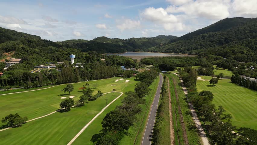 Road in the forest against the background of hills. Part 3