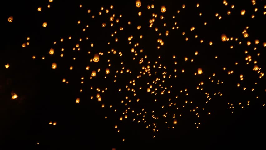 Khom Loi Lanterns Flying During Yi Peng Lantern Festival In Northern Thailand. Low Angle Shot