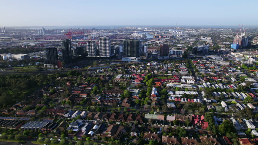 Aerial tracking shot over the Adelaide cityscape, sunny day in Australia