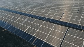 Aerial static view solar panel farm in Siauliai city, Lithuania. Renewable energy in baltics, Europe union. Sustainable electric power plant with many rows of solar photovoltaic panels - Powered by Shutterstock - Get 15% off with code: PIKWIZARD15