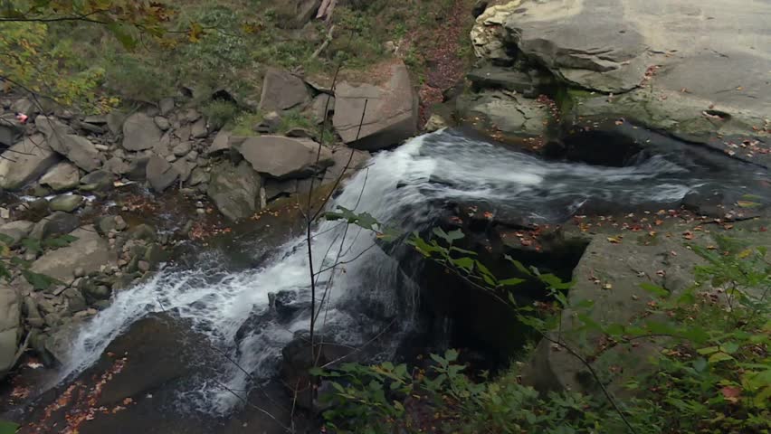 Rushing stream cutting through rocky terrain in Cuyahoga Valley National Park