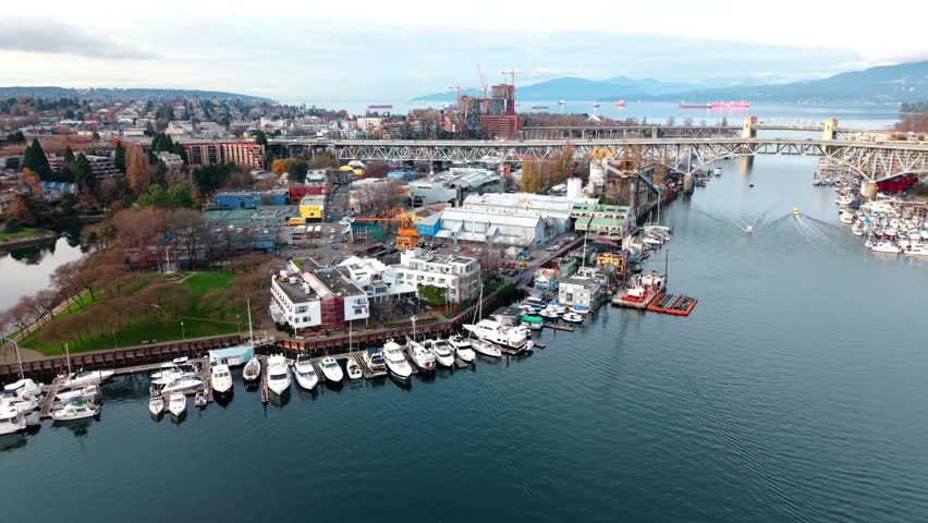 A downtown Vancouver (British Columbia, Canada) aerial drone clips of real estate buildings, condos, and apartments.