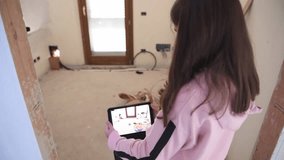 Interactive AR Experience: Girl Shows Virtual Furniture in a Spacious Empty Room - Powered by Shutterstock - Get 15% off with code: PIKWIZARD15