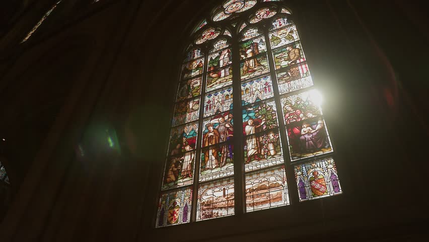 stained glass window in cathedral in sunlight - Powered by Shutterstock - Get 15% off with code: PIKWIZARD15