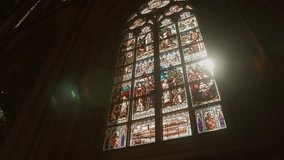stained glass window in cathedral in sunlight - Powered by Shutterstock - Get 15% off with code: PIKWIZARD15
