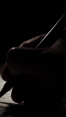 man journaling his thoughts into notebook, because he has some sort of depression, problems and want to find out and help himself without psychologist