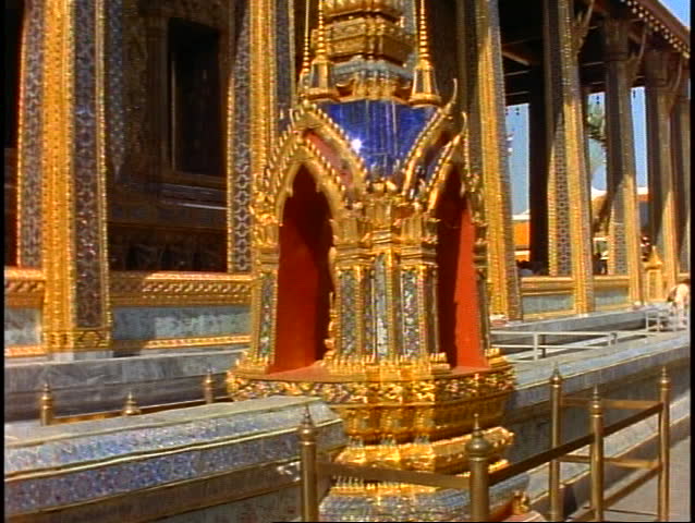 Royal Palace of Bangkok, close up gilt detail, tilt up