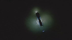 boat with spotlights for catching squid at night in the open sea - Powered by Shutterstock - Get 15% off with code: PIKWIZARD15