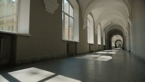 Empty corridor in university hall long college hallway academy high school indoors room without people students indoor building interior studying education learning sunlight sunbeams sun light windows - Powered by Shutterstock - Get 15% off with code: PIKWIZARD15