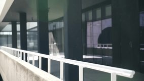 Young business woman enjoying a moment of relax on a modern building balcony, taking a deep breath - Powered by Shutterstock - Get 15% off with code: PIKWIZARD15