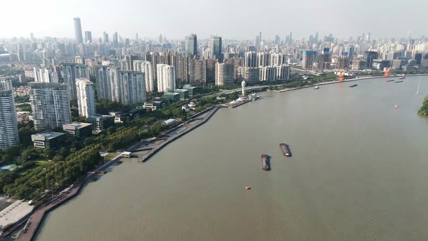 Drone Cityscape of Shanghai China, Huangpu river across Asian Downtown