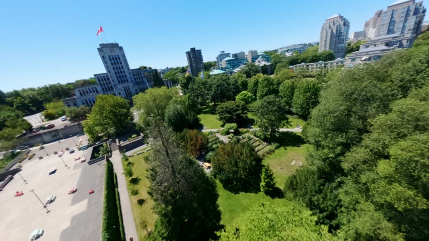 Green Trees At Community Garden In Front Of Vancouver City Hall On A Sunny Day In BC, Canada. - aerial shot