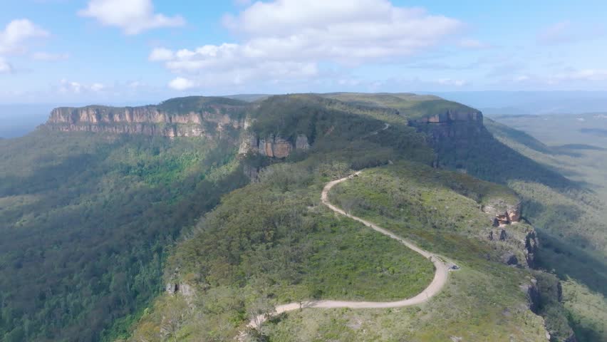 Drone aerial footage of the scenic Narrow Neck Plateau and Peninsula located between Jamison Valley and Megalong Valley near Katoomba in the Blue Mountains in New South Wales, Australia.