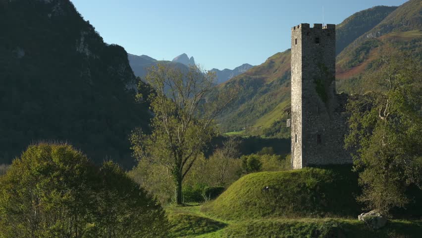 View on the tower of Castet with the pic du midi d'Ossau in the background.