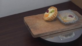 From scratch to sweet perfection. This thumbnail captures a glimpse of the fruit tart making process. Watch the full video to learn step-by-step how to bake this beautiful and delicious dessert. - Powered by Shutterstock - Get 15% off with code: PIKWIZARD15