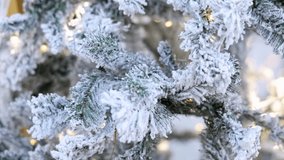 A closeup view showcasing frosted evergreen branches, meticulously adorned with soft, twinkling lights that enhance the scene, creating a truly magical and enchanting winter atmosphere - Powered by Shutterstock - Get 15% off with code: PIKWIZARD15