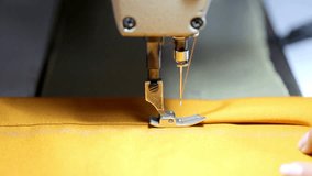 woman using a vintage sewing machine in her house working part of sewing machine in action during the coronavirus pandemic working apd face mask - Powered by Shutterstock - Get 15% off with code: PIKWIZARD15