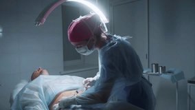 In a dimly lit operating room, a surgeon in protective gear carefully performs a stomach incision on a patient lying on the table, ensuring precision and safety during the procedure. - Powered by Shutterstock - Get 15% off with code: PIKWIZARD15