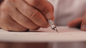 Close up man hand male holding fountain pen write writing paper document contract author writer signing handwriting signature letter desk office paperwork text page vintage business businessman detail - Powered by Shutterstock - Get 15% off with code: PIKWIZARD15
