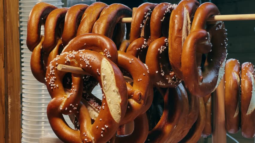 Freshly baked homemade Bretzel. Traditional German baked goods sold at a Christmas market.
