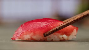 Sushi Sashimi Nigiri Platter, japanese gunkan maki sushi restaurant, Fresh Tuna and Salmon Slices in modern cafe, traditional food, raw red fish dish, omega 3. - Powered by Shutterstock - Get 15% off with code: PIKWIZARD15