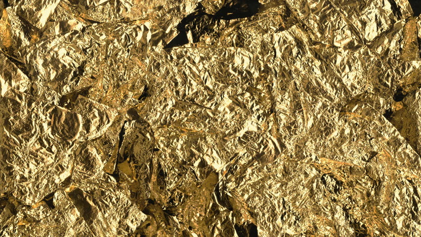 Abstract animation of Gold Crinkled Metallic Paper. Golden background. Seamless loop. Slideshow. Low frame rate effect.