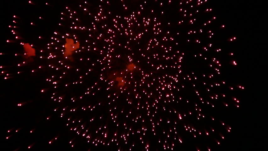 Single volleys firework splits millions of lights in the night sky