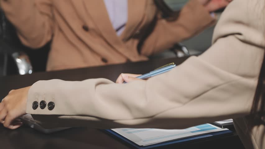 House model with agent and customer discussing calculate for price contract to buy, get insurance or loan real estate or property.

