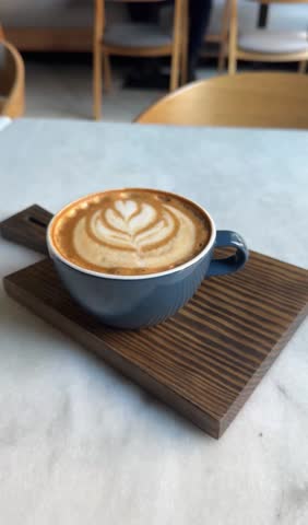 Vertical video of coffee cup with mug. 