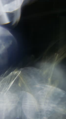 Radiant lens flare cascading over soft, glowing bokeh circles, creating a dreamy and ethereal light effect