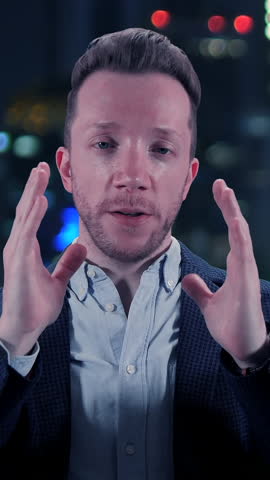 A Professional Speaker Positioned Against a Vibrant Cityscape Background Enhances Engagement