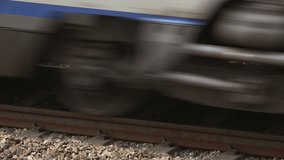 Wheels of a high-speed train running quickly on gravel tracks - Powered by Shutterstock - Get 15% off with code: PIKWIZARD15