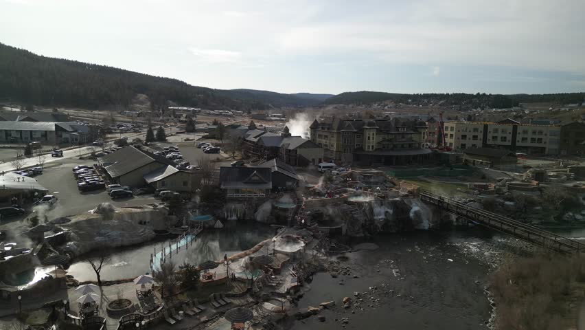 Aerial above Pagosa Hot Springs Resort along San Juan River in Colorado in winter