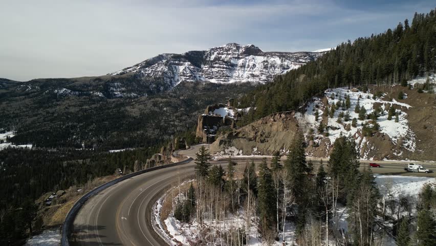 Aerial of snowy Southern Colorado mountains on Wolf Creek Pass in winter
