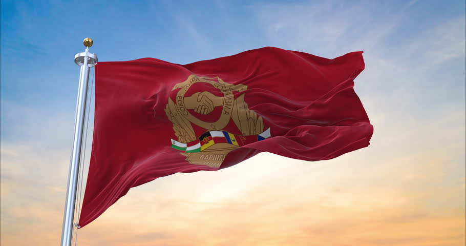 Flag of Warsaw Pact realistic waving in the wind with sundown background (Perfect Loop)