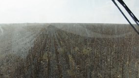 An agricultural tractor. Harvesting sunflower seeds. - Powered by Shutterstock - Get 15% off with code: PIKWIZARD15