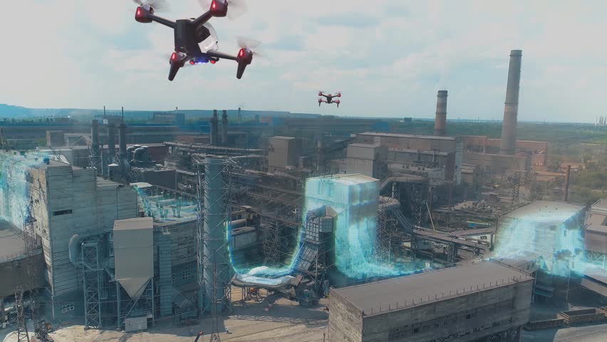 A drone flying over a factory. Aerial Drone View Of Industrial Area. Autonomous Flight. Smart Industry, Smart Factory. - Powered by Shutterstock - Get 15% off with code: PIKWIZARD15