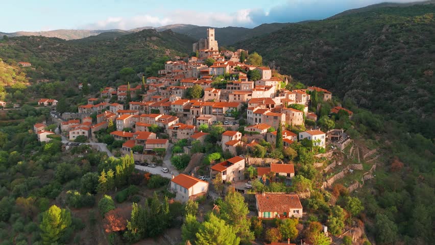 Aerial view of Eus, the medieval hilltop town in Pyrenees mountains, France, one of the most beautiful villages of France and a popular tourist destination