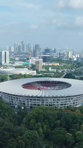Aerial view of multi-purpose stadium, Gelora Bung Karno or GBK Main Stadium located in Central Jakarta, Indonesia. A venue used for sports, concerts, and other events