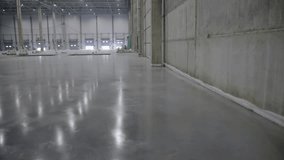This spacious and expansive industrial warehouse features beautiful polished concrete flooring. Clip - Powered by Shutterstock - Get 15% off with code: PIKWIZARD15