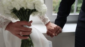 bride's hand with a wedding ring on a wedding dress - Powered by Shutterstock - Get 15% off with code: PIKWIZARD15